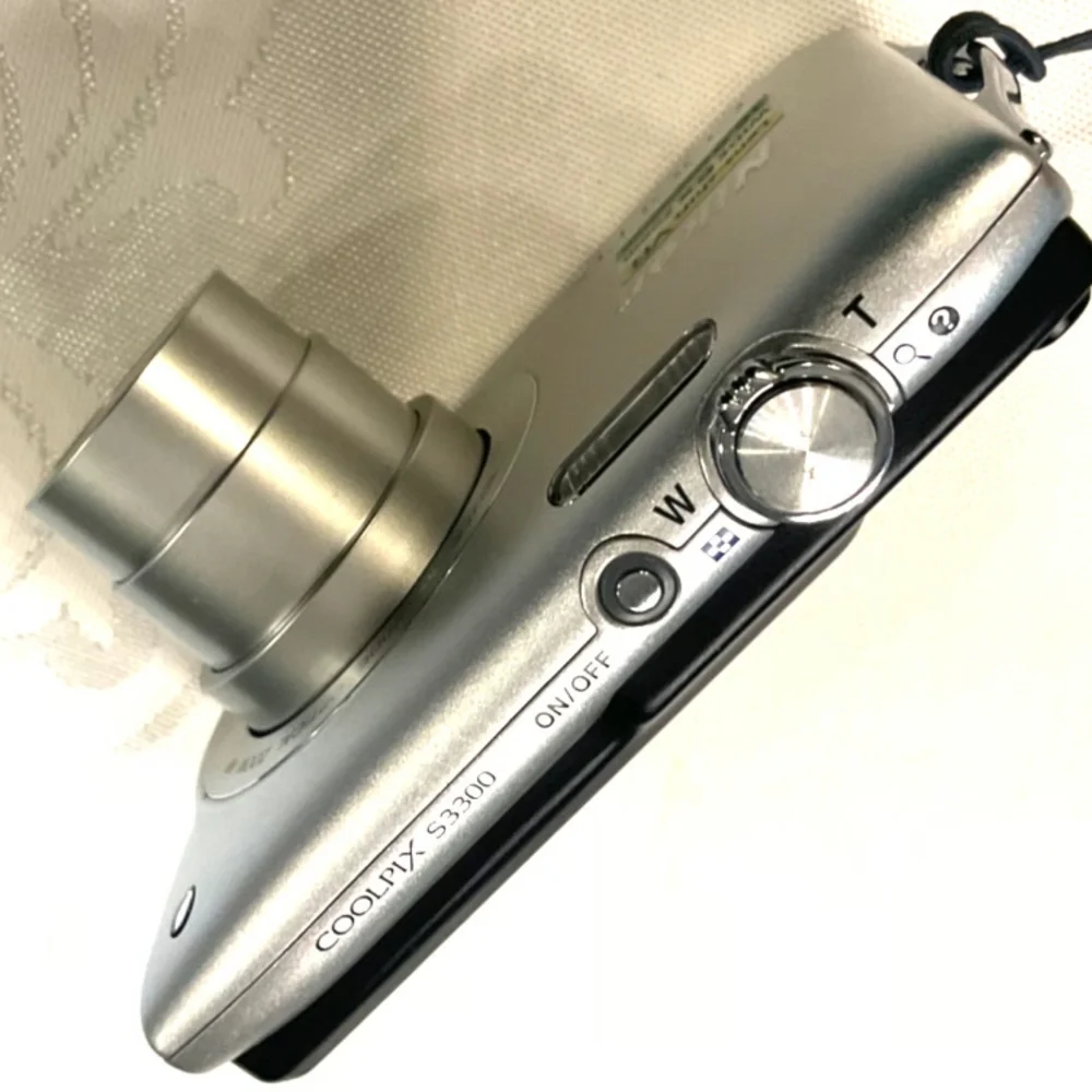 Nikon Coolpix Silver Camera with Accessories